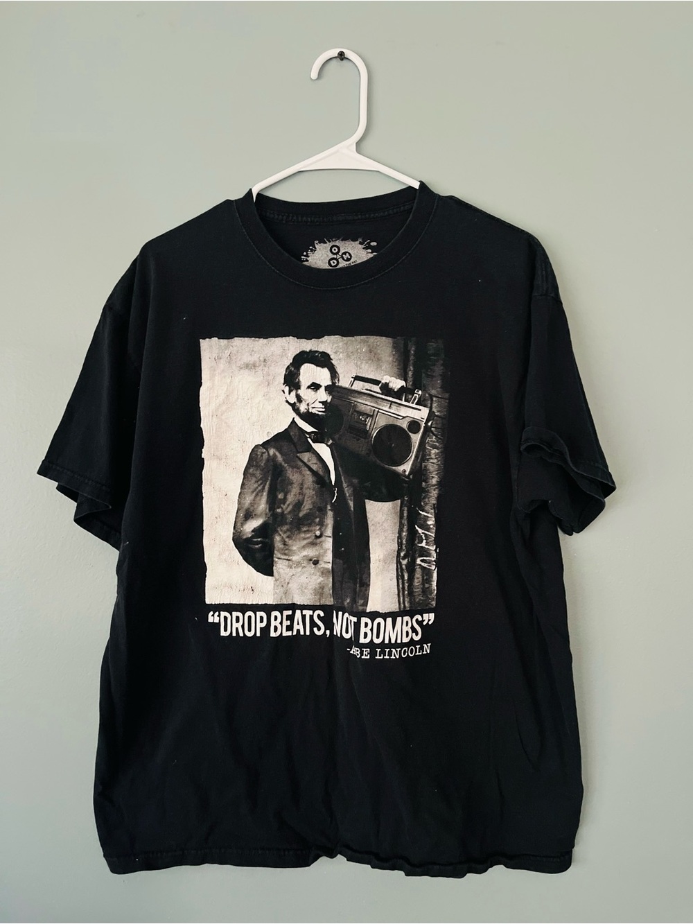 Black Graphic 'Drop Beats, Not Bombs' T‑Shirt